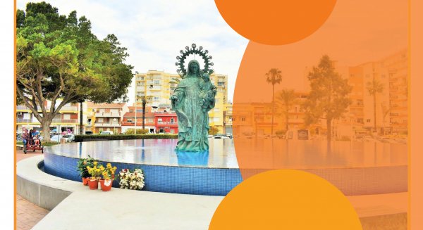 La fuente de la Virgen del Carmen de Torre del Mar se ilumina hoy de naranja por el TDAH