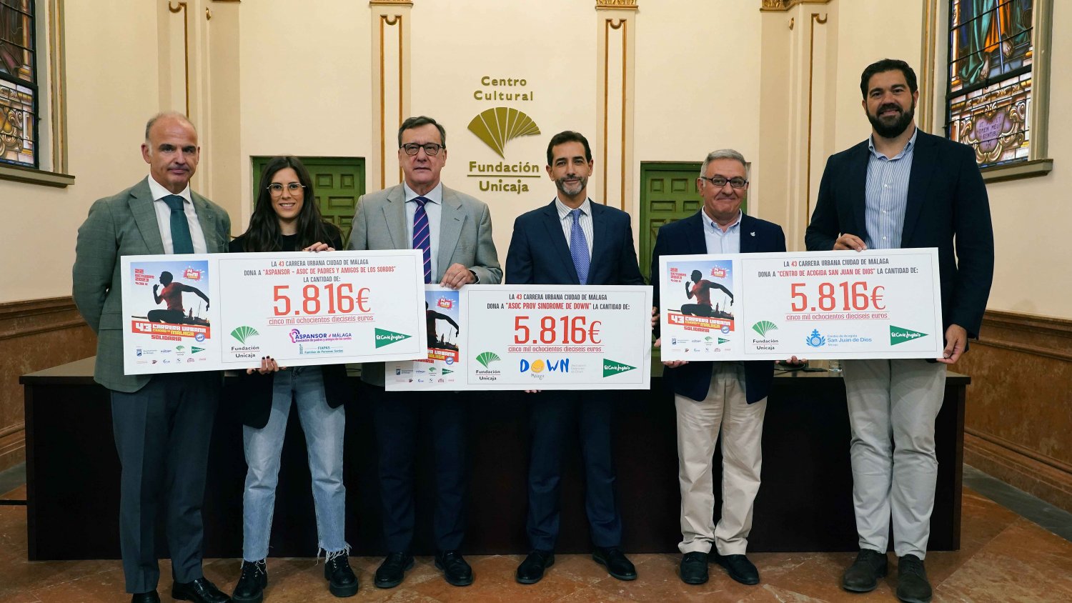 El Centro de Acogida San Juan de Dios, Down Málaga y Aspansor reciben la recaudación de la 43ª Carrera Urbana ‘Ciudad de Málaga’